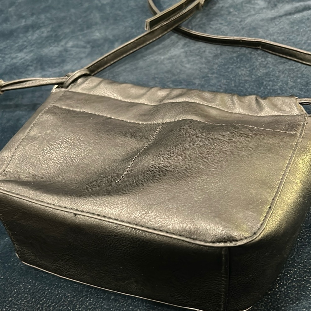 New small black hand bag, cross body or over the shoulder bag.